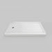 White Acritec low profile single threshold shower base with end drain (LH) in a modern alcove installation