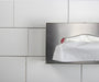 Frost 180 stainless steel facial tissue dispenser in use