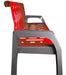 Red outdoor steel bench with anchorable feet installed in public plaza