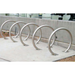 Close-up of horseshoe shaped stainless steel bike rack for secure locking