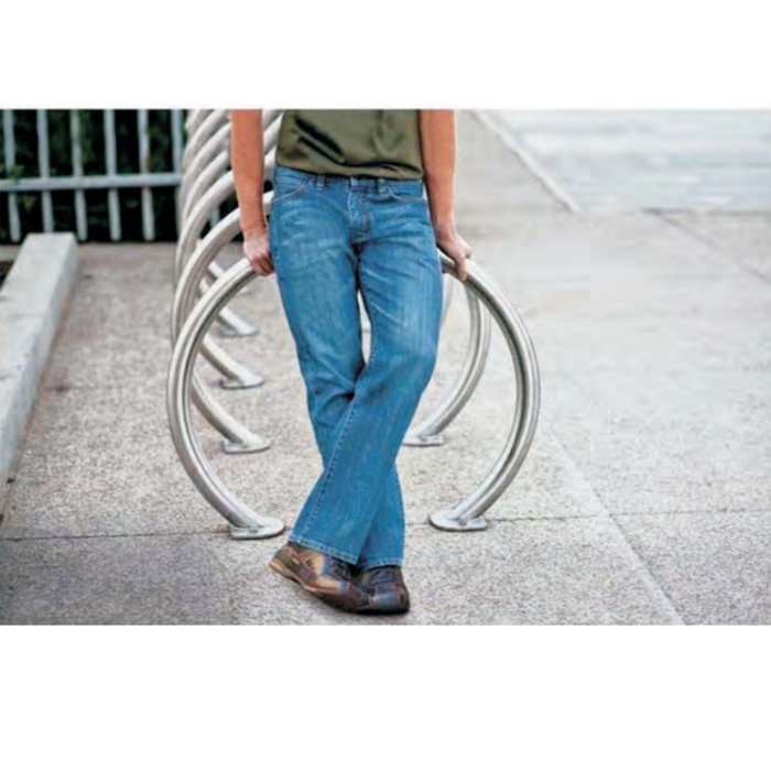 Row of multiple Envyrozone Horseshoe bike racks in outdoor installation