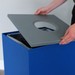 Close-up of embossed Mixed Recyclables slot on blue lid