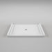 White Acritec minimalist single threshold shower base with center drain and ultra-low profile in a contemporary bathroom